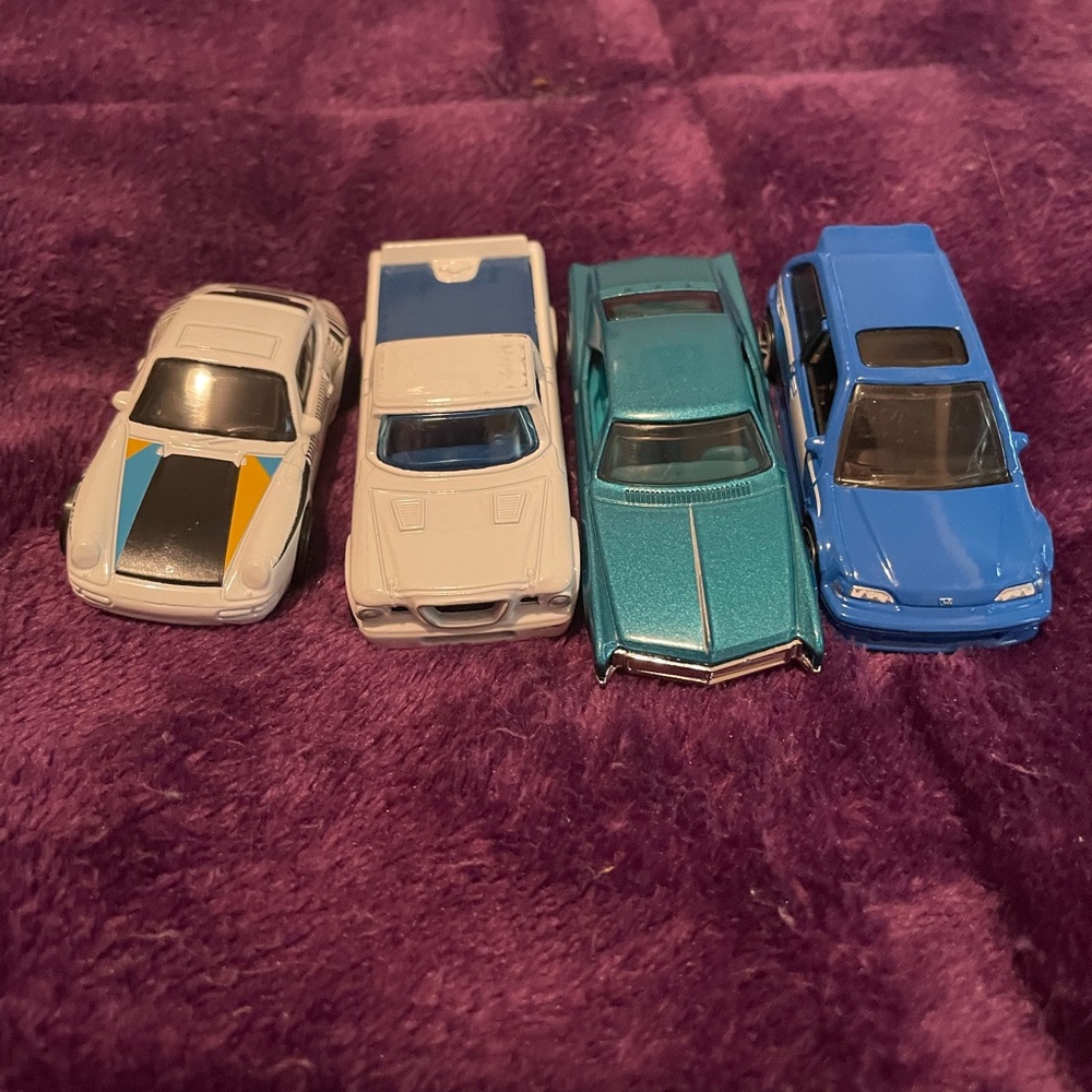 White and Blue Vintage Toy Cars Set
